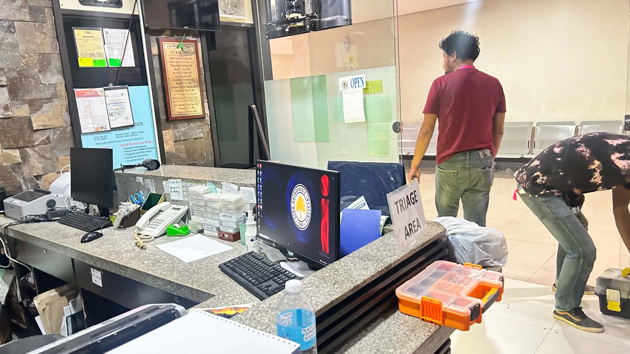 Everyday Pharmacy office entrance and work area during setup.