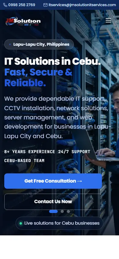 The JMSolutions IT Services homepage viewed on a mobile phone screen.