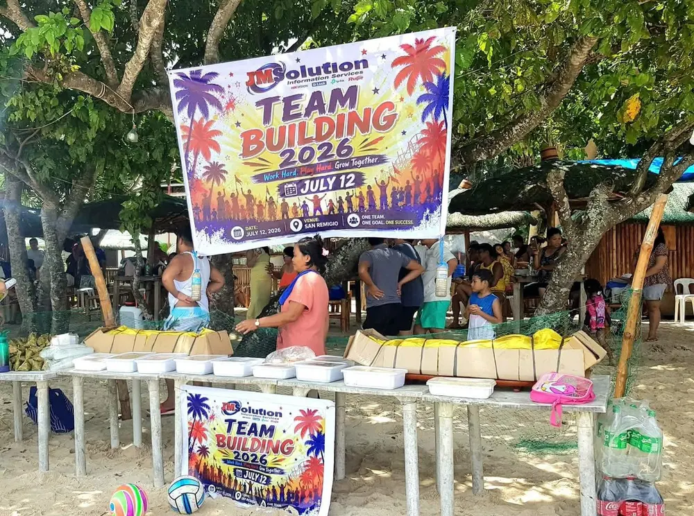 The JM Solution Team Building 2026 event banner: Work Hard, Play Hard, Grow Together — July 12, San Remigio.